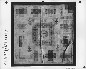 Embroidered darning sampler