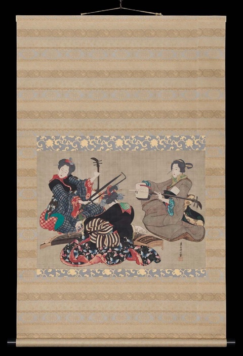 This hanging scroll features a rectangular drawn image of three musicians facing each other dressed 